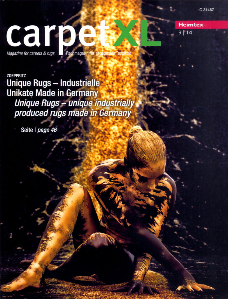 Auf dem Titelbild eines Teppich-Fachmagazins ist ein Foto abgebildet, welches Künstler Jörg Düsterwald mittels Bodypainting mit einem gelbschwarz bemalten Fotomodell für das Unternehmen DURA-Teppichwerke als Werbefoto realisierte.